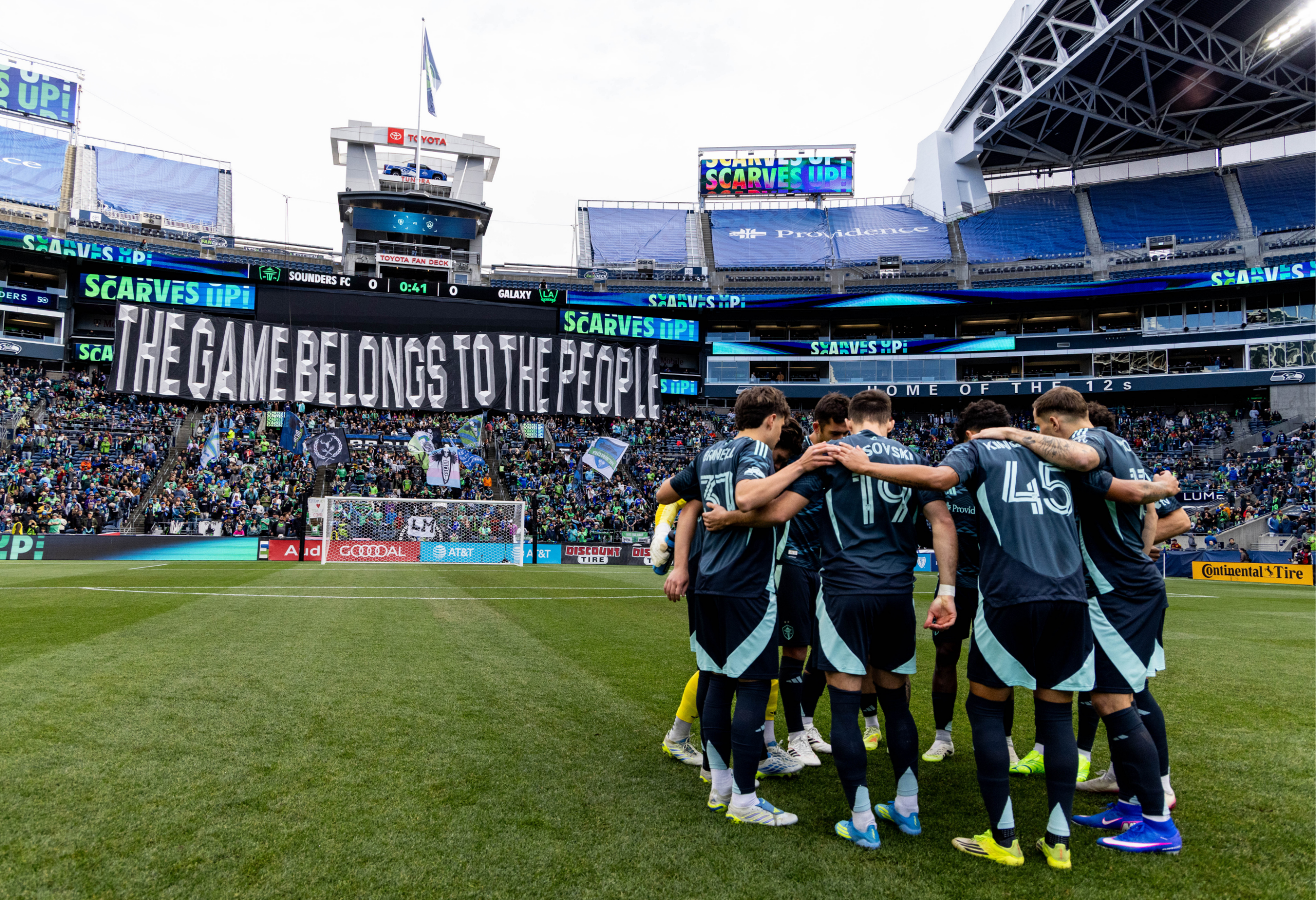 Sounders partnership huddle up 2630x1800 Seattle Sounders Players in a huddle with arms around each other before the pitch